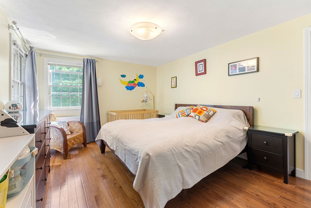 30 Granite Street Dedham, MA 02026 - Photo 15 of 36 a bedroom with a bed and a window