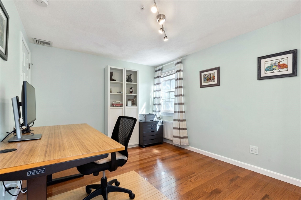 30 Granite Street Dedham, MA 02026 - Photo 20 of 36 a view of a workspace with furniture and a window