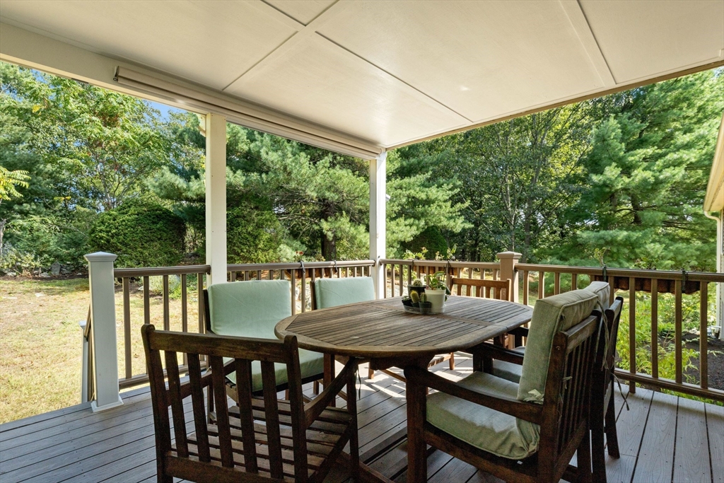 30 Granite Street Dedham, MA 02026 - Photo 25 of 36 a view of balcony with furniture and wooden deck