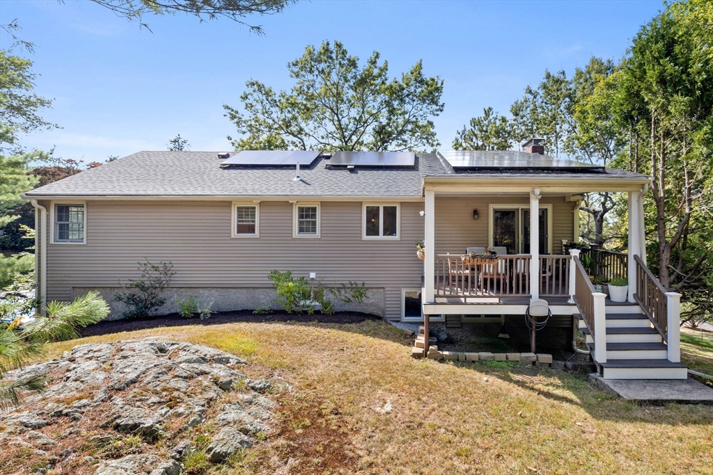 30 Granite Street Dedham, MA 02026 - Photo 27 of 36 front view of a house with a yard