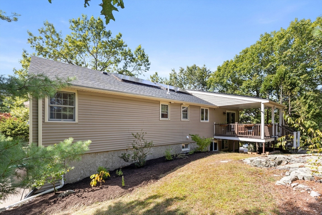 30 Granite Street Dedham, MA 02026 - Photo 28 of 36 a front view of a house with garden