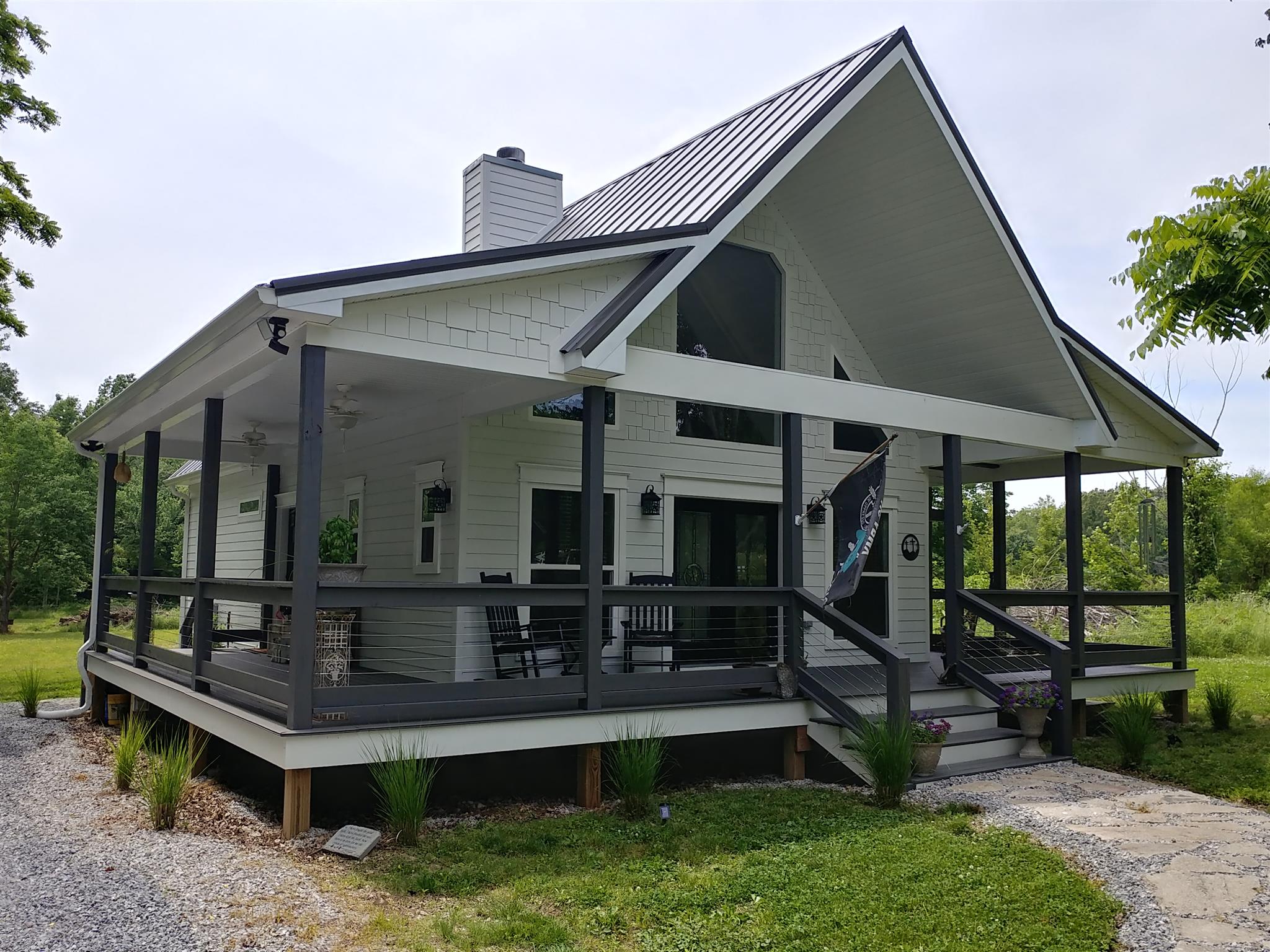 4055 Flewellyn Road Springfield, TN 37172 - Photo 1 of 28 a front view of a house with a yard