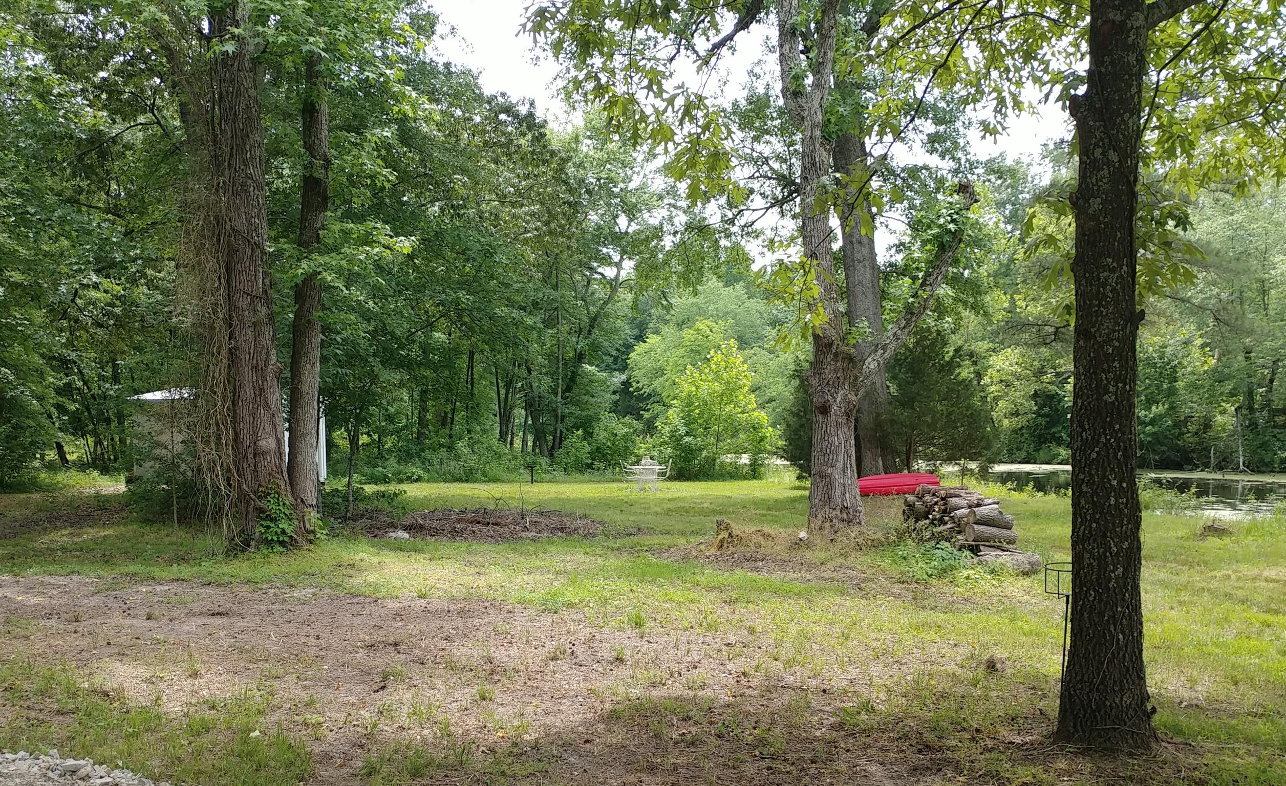 4055 Flewellyn Road Springfield, TN 37172 - Photo 22 of 28 a view of a yard with large trees