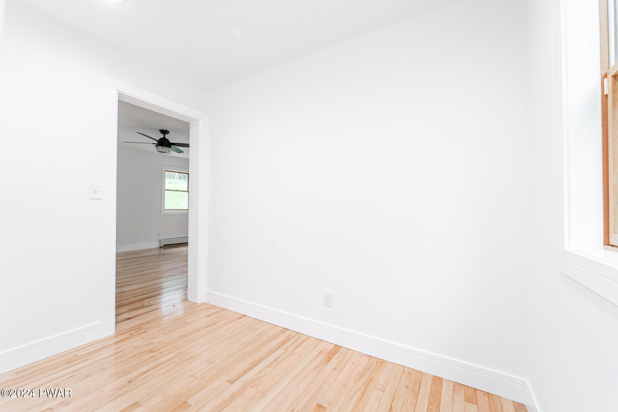 144 Log Tavern Road Milford, PA 18337 - Photo 29 of 45 a view of a hallway with wooden floor and closet