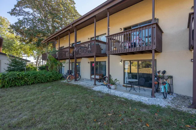 a view of a chairs and tables in the patio