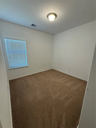 an empty room with a workbench