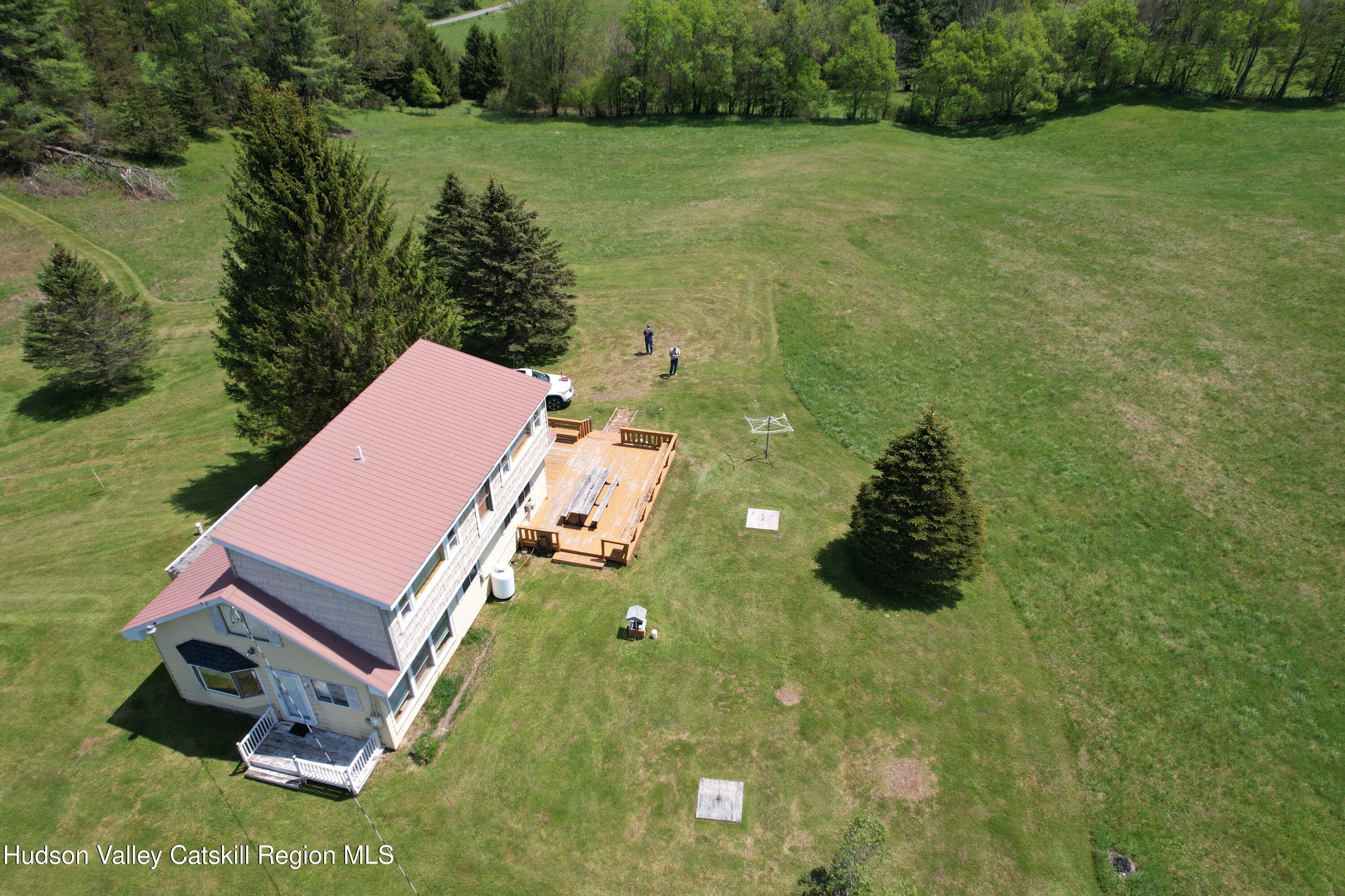 119 South Mountain Road Gilboa, NY 12076 - Photo 1 of 24 a aerial view of a house with a yard