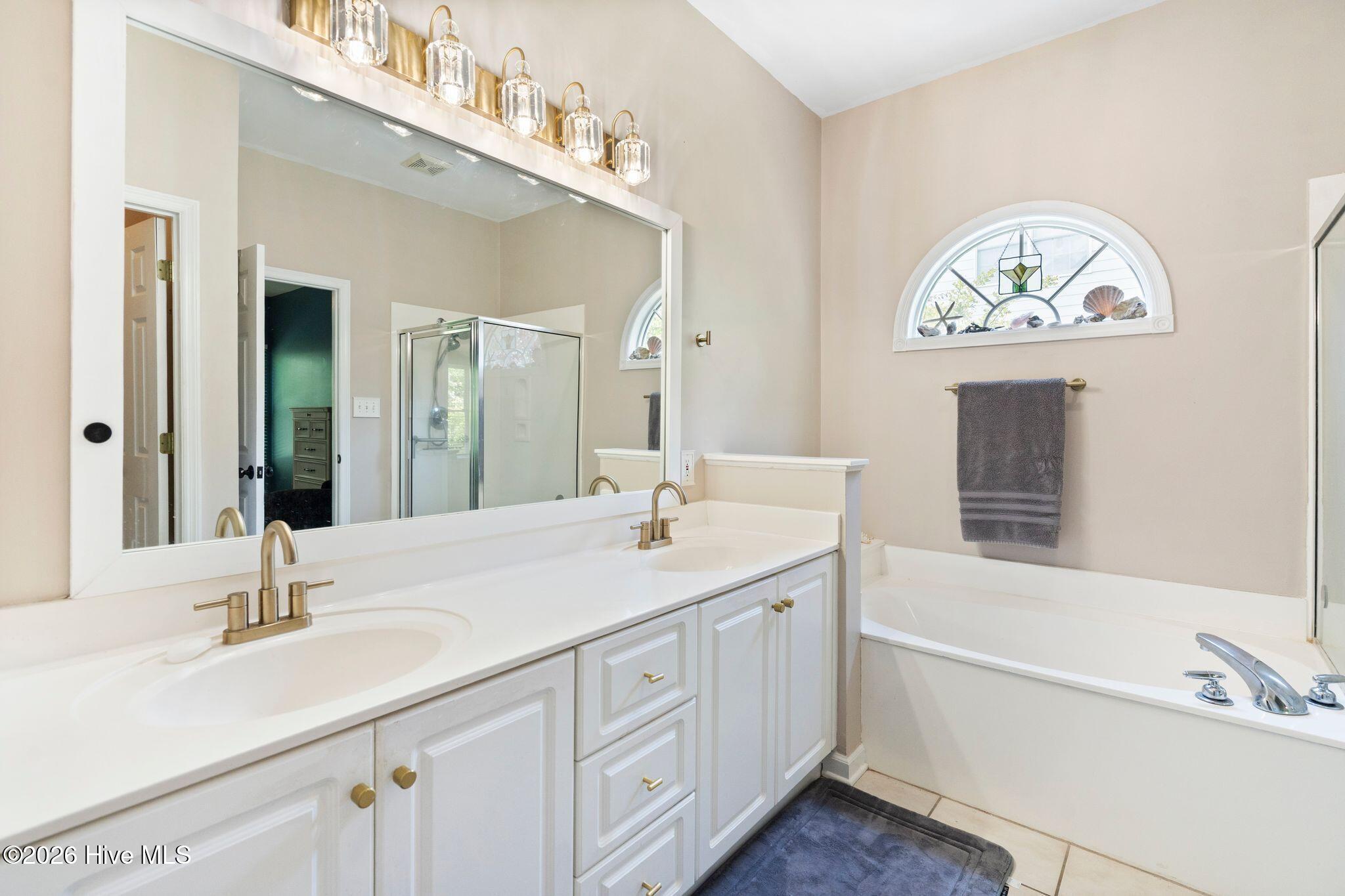 1128 Mill Run Road Sneads Ferry, NC 28460 - Photo 21 of 65 Owner's Suite Bathroom