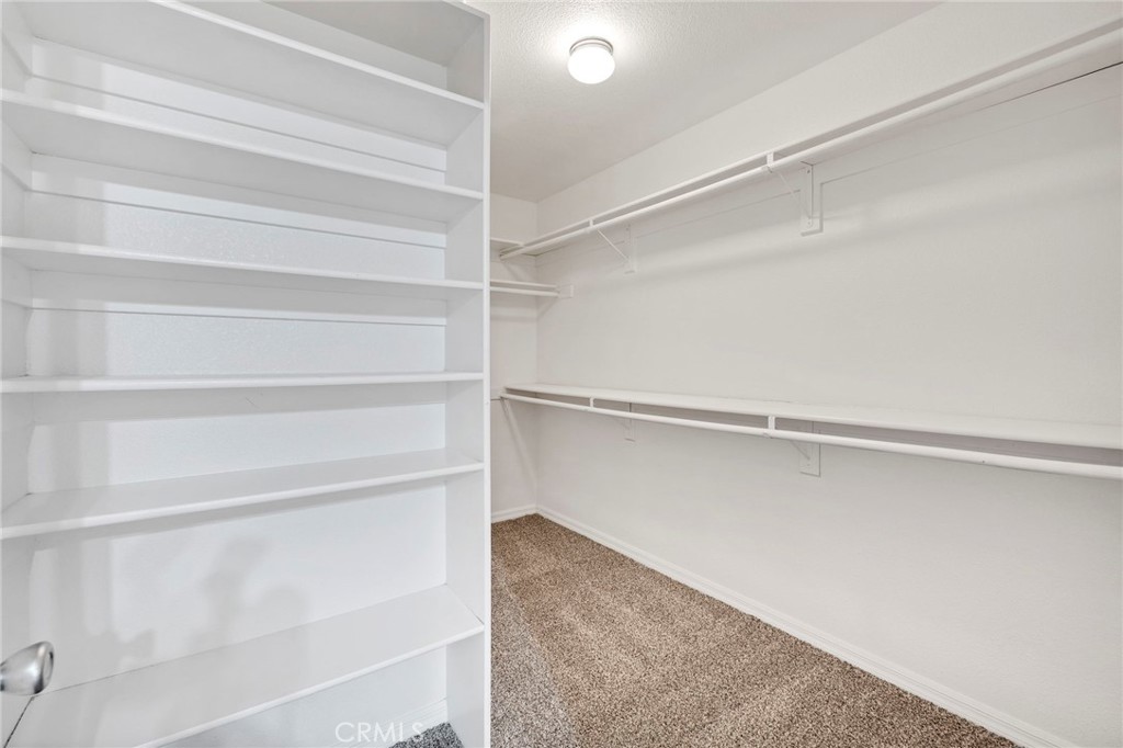 1230 Shellie Lane Hemet, CA 92543 - Photo 21 of 44 a view of an empty walk in closet