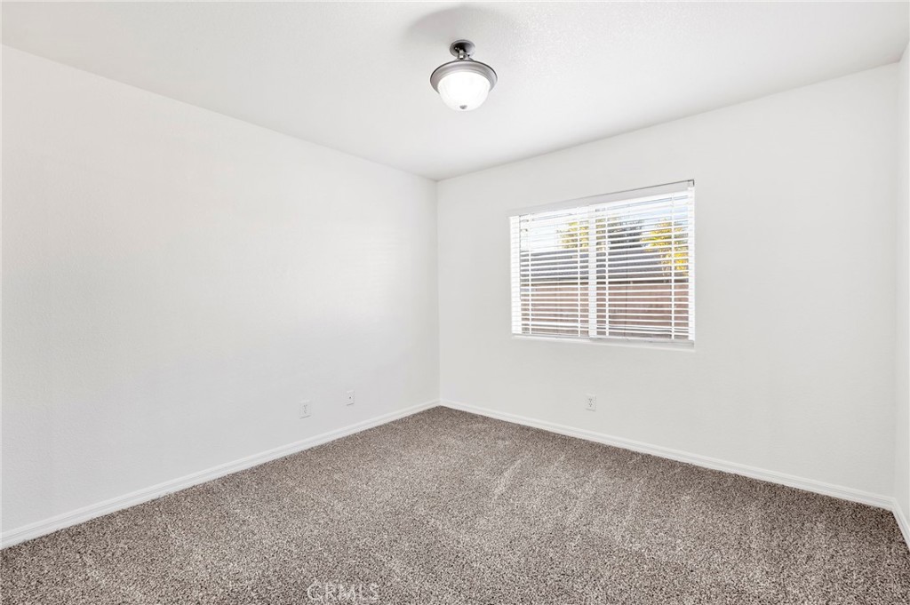 1230 Shellie Lane Hemet, CA 92543 - Photo 26 of 44 a view of an empty room with a window