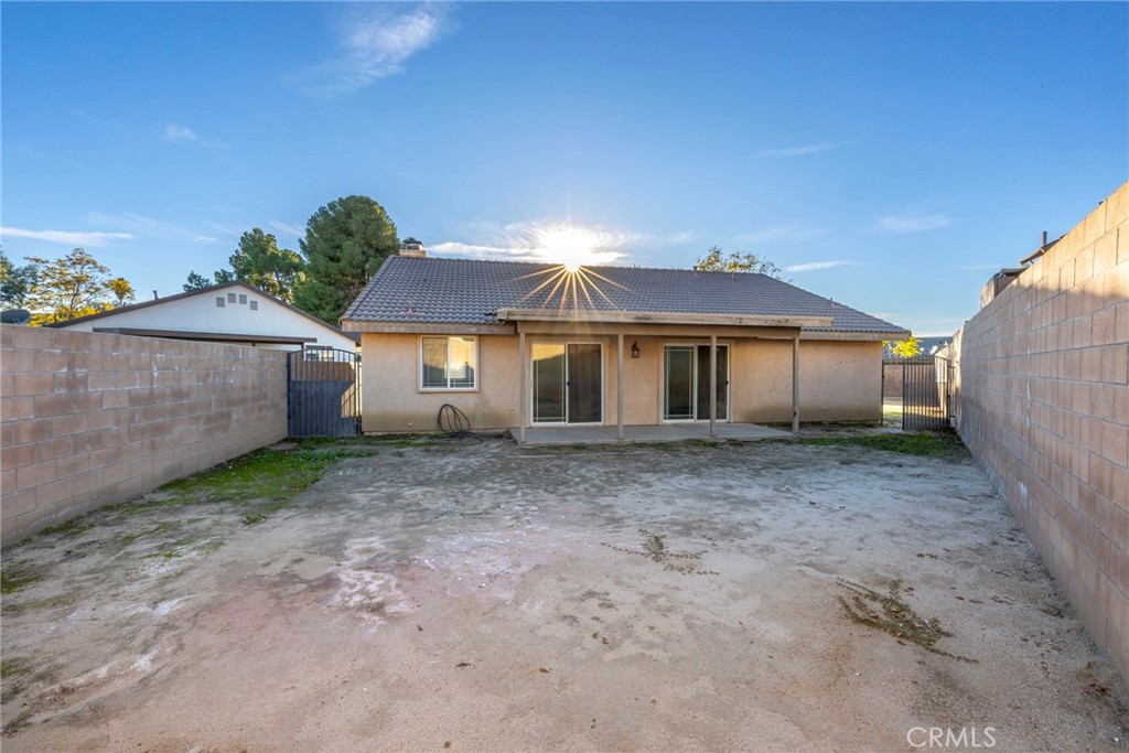 1230 Shellie Lane Hemet, CA 92543 - Photo 29 of 44 front view of a house with a yard