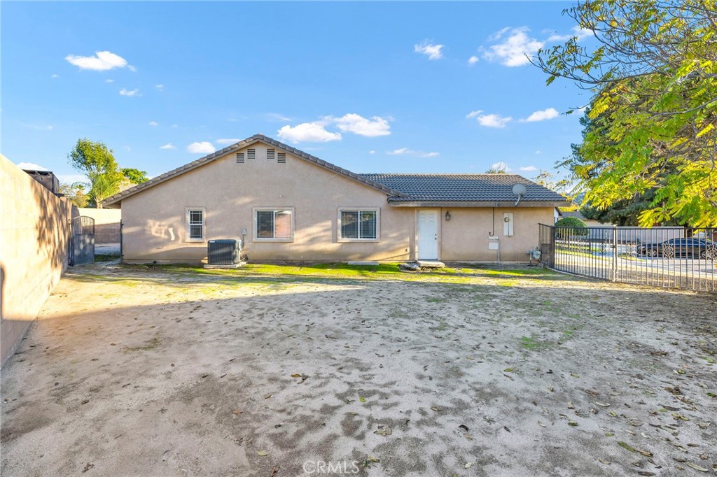 1230 Shellie Lane Hemet, CA 92543 - Photo 33 of 44 a view of a house with backyard and swimming pool