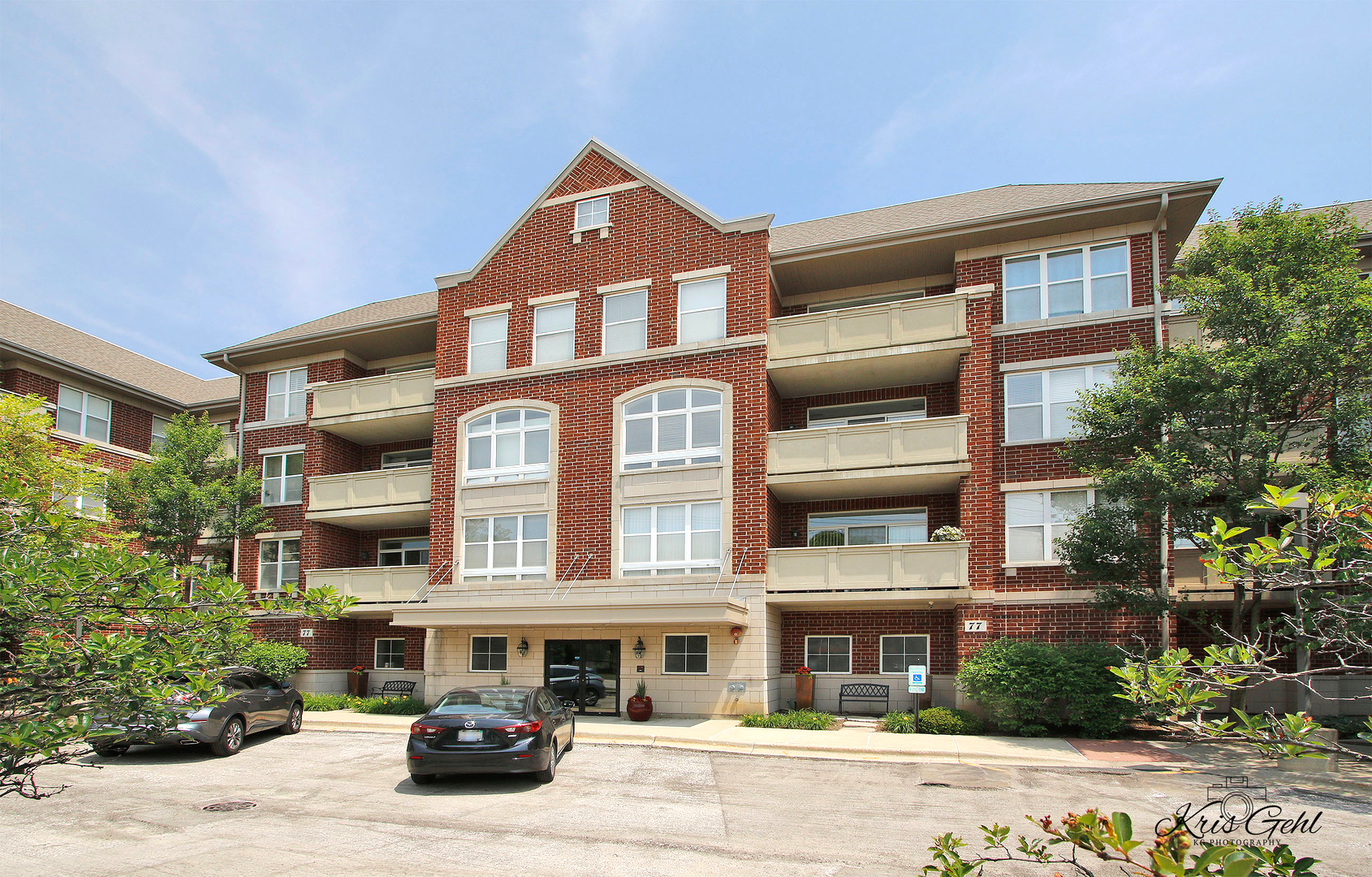 77 North Quentin Road, Unit 212 Palatine, IL 60067 - Photo 1 of 1 a front view of a building