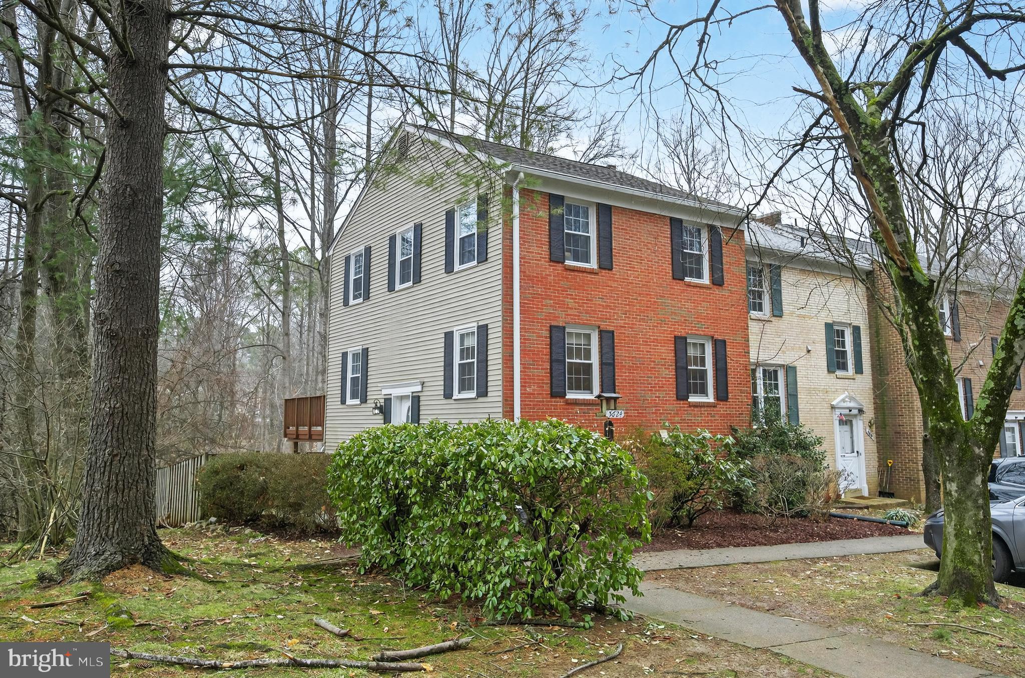 5624 Kirkham Court Springfield, VA 22151 - Photo 1 of 52 a front view of a house with yard and trees