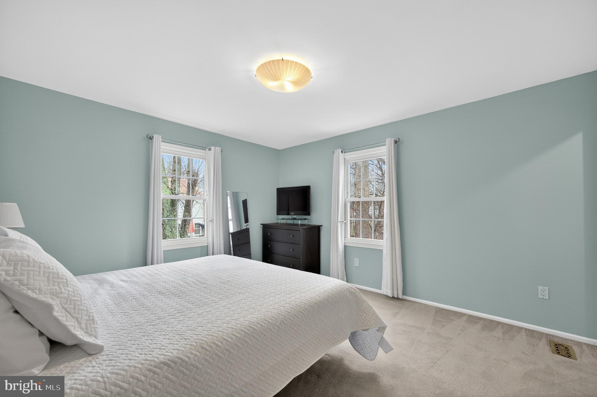 5624 Kirkham Court Springfield, VA 22151 - Photo 19 of 52 a bedroom with a bed and a window