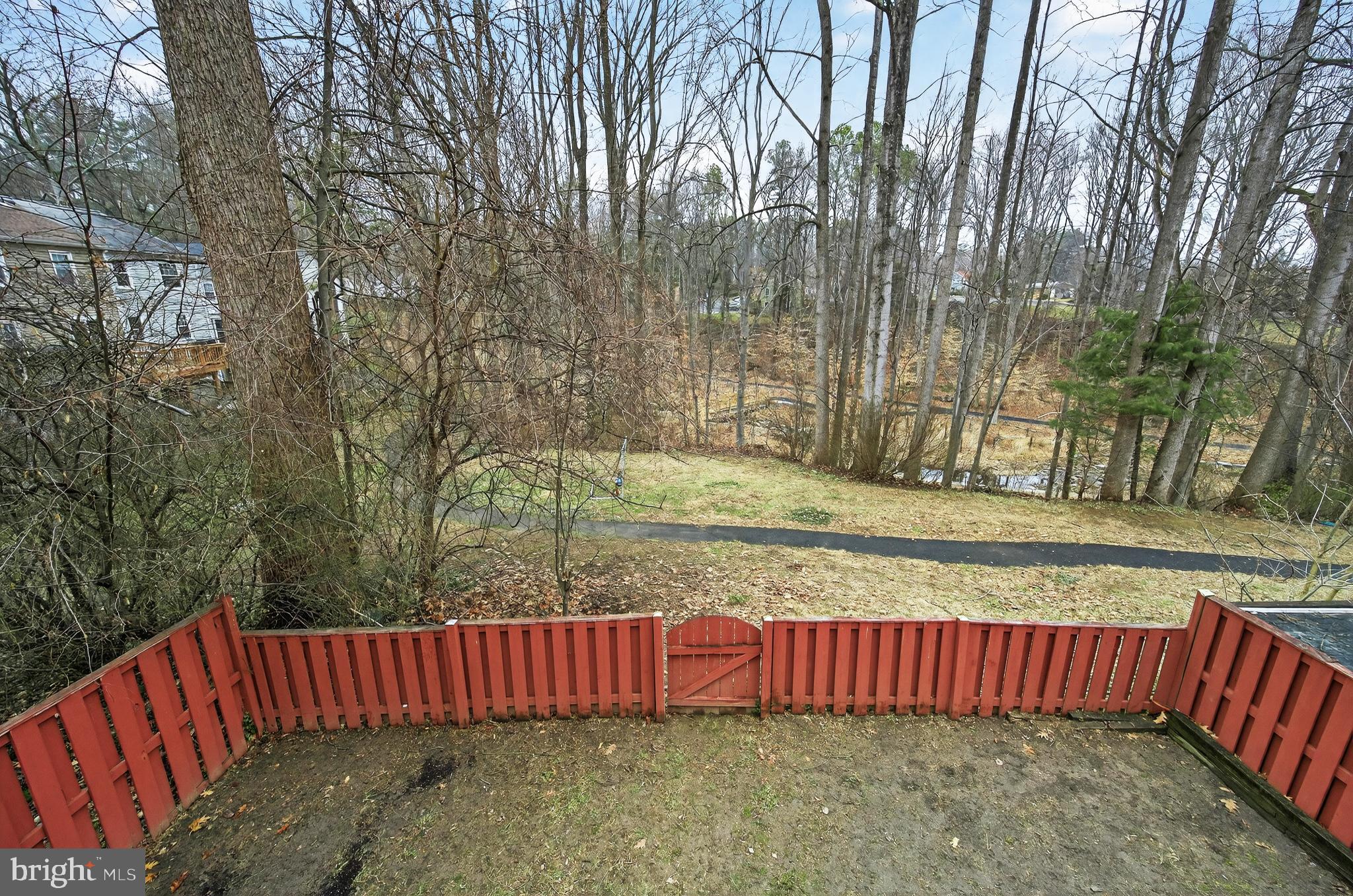 5624 Kirkham Court Springfield, VA 22151 - Photo 40 of 52 a view of outdoor space with swimming pool and trees