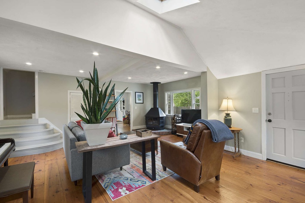 17 Evergreen Road Natick, MA 01760 - Photo 3 of 29 a living room with furniture potted plant and a window