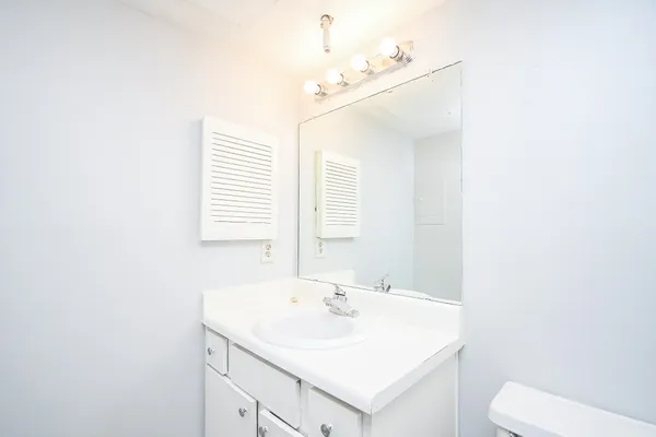 a bathroom with a sink and a toilet