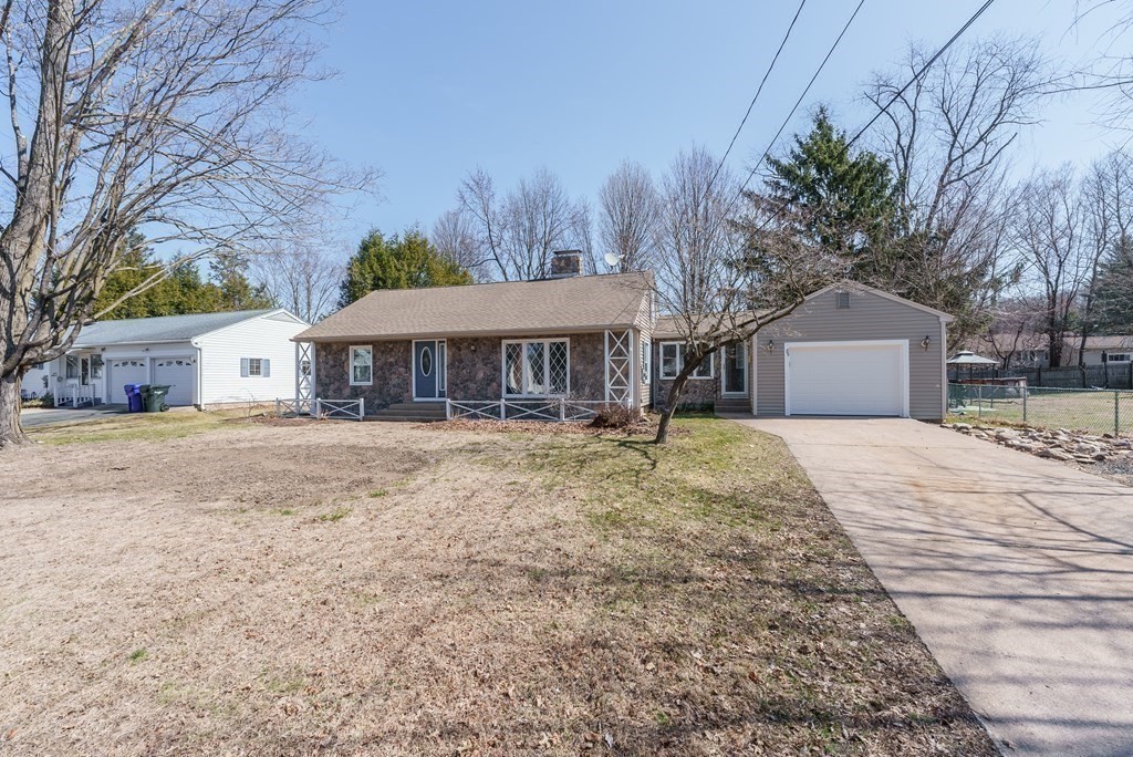 85 West Allen Ridge Road Springfield, MA 01118 - Photo 8 of 41 a front view of a house with a yard and trees