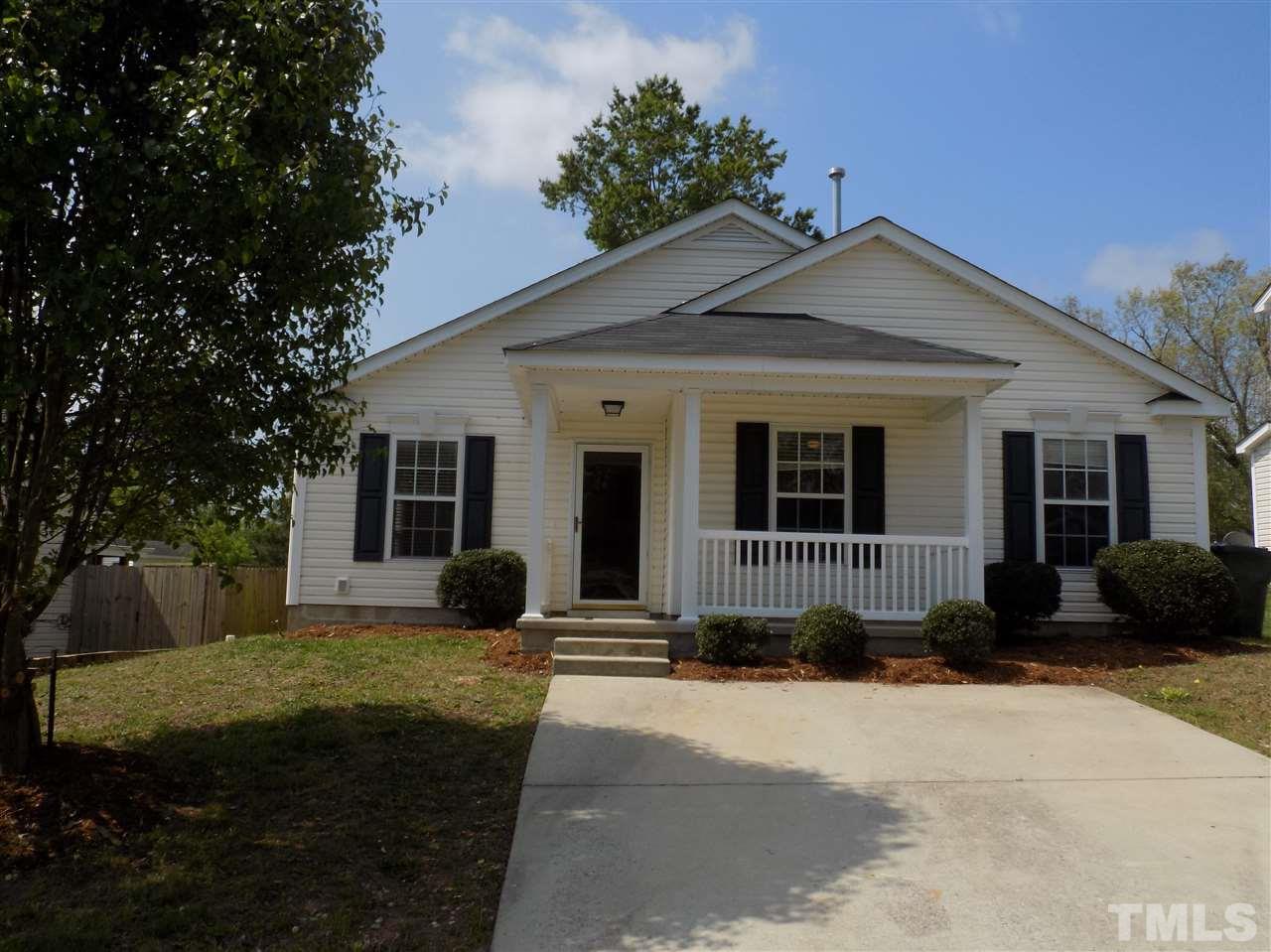 5401 Marthonna Way Raleigh, NC 27616 - Photo 2 of 12 a front view of a house with a yard