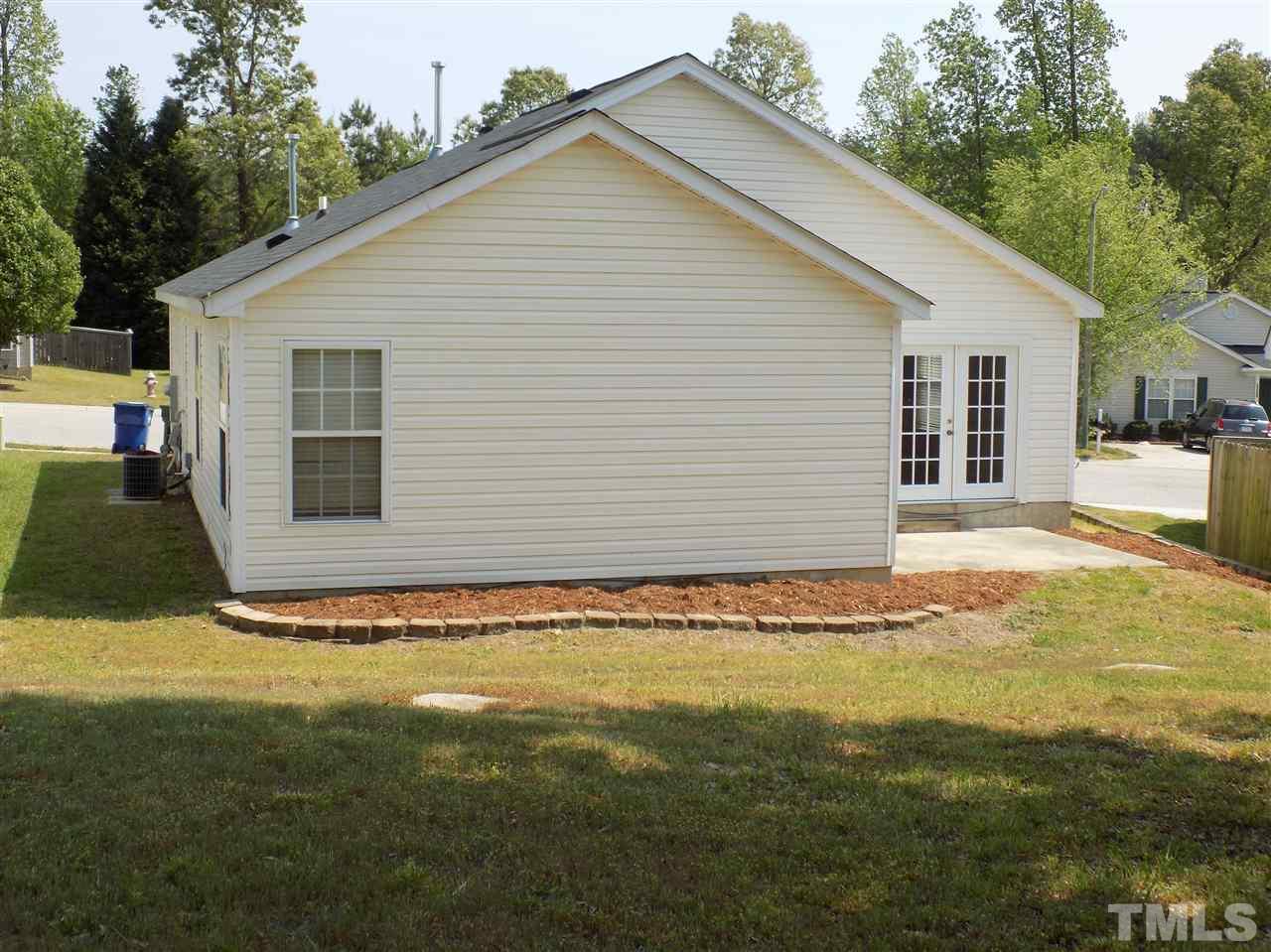 5401 Marthonna Way Raleigh, NC 27616 - Photo 12 of 12 a view of a backyard of the house