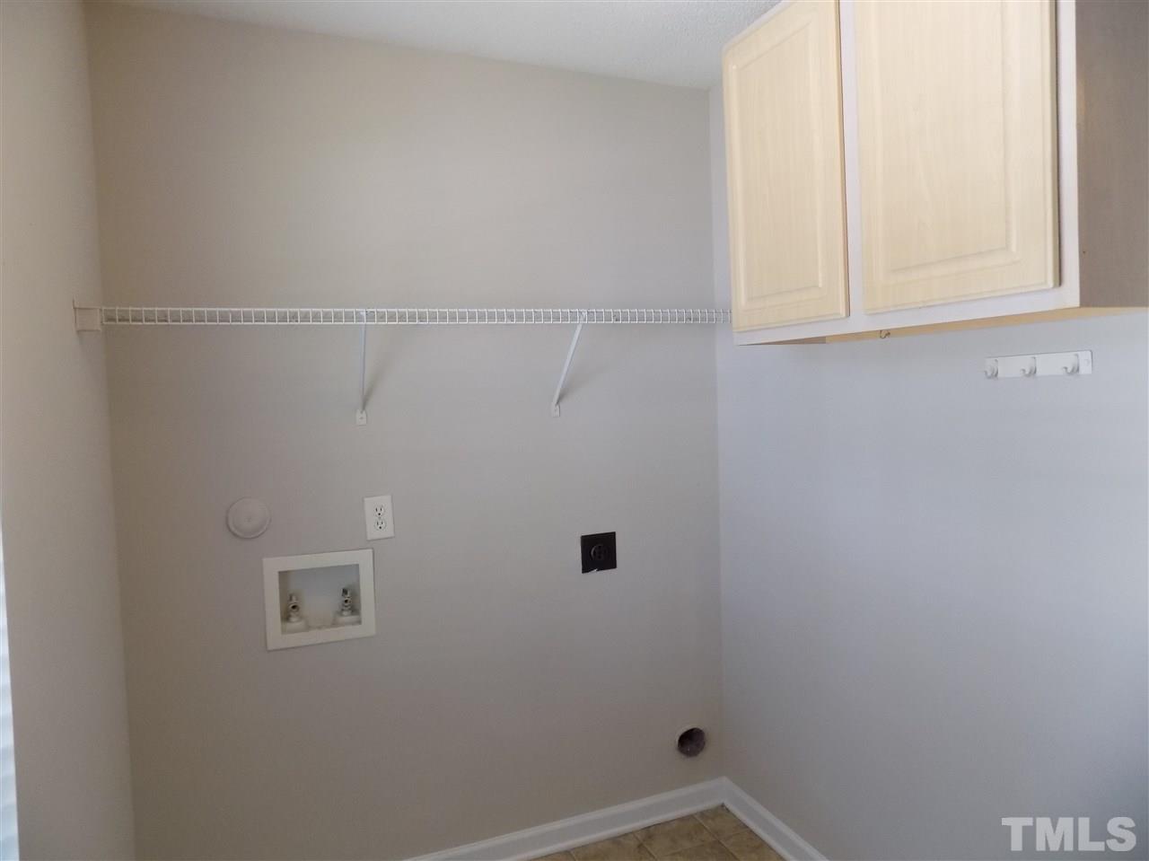 5401 Marthonna Way Raleigh, NC 27616 - Photo 5 of 12 a bathroom with a window