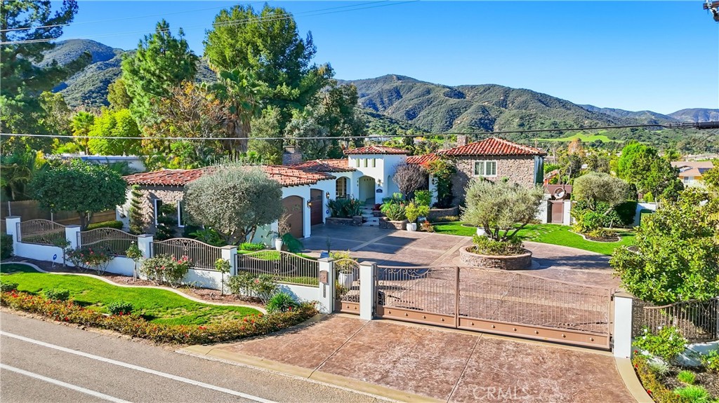 a view of house with outdoor space and street view