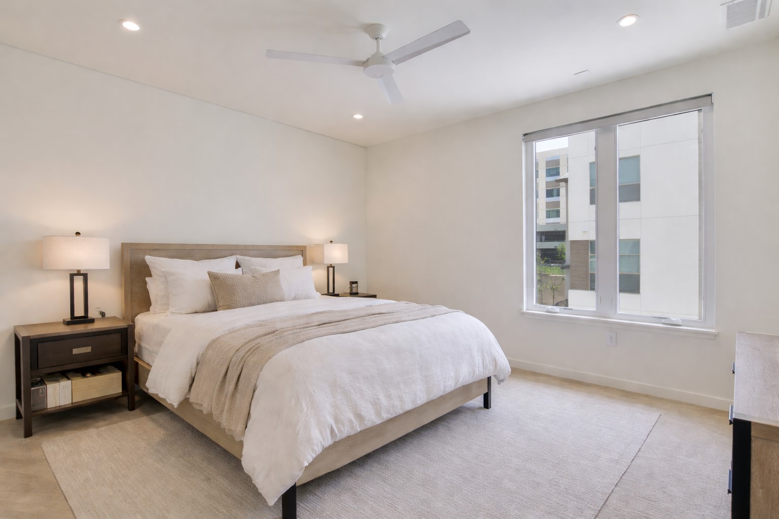 2610 Watkins Way Austin, TX 78746 - Photo 21 of 23 a bedroom with a bed and a window