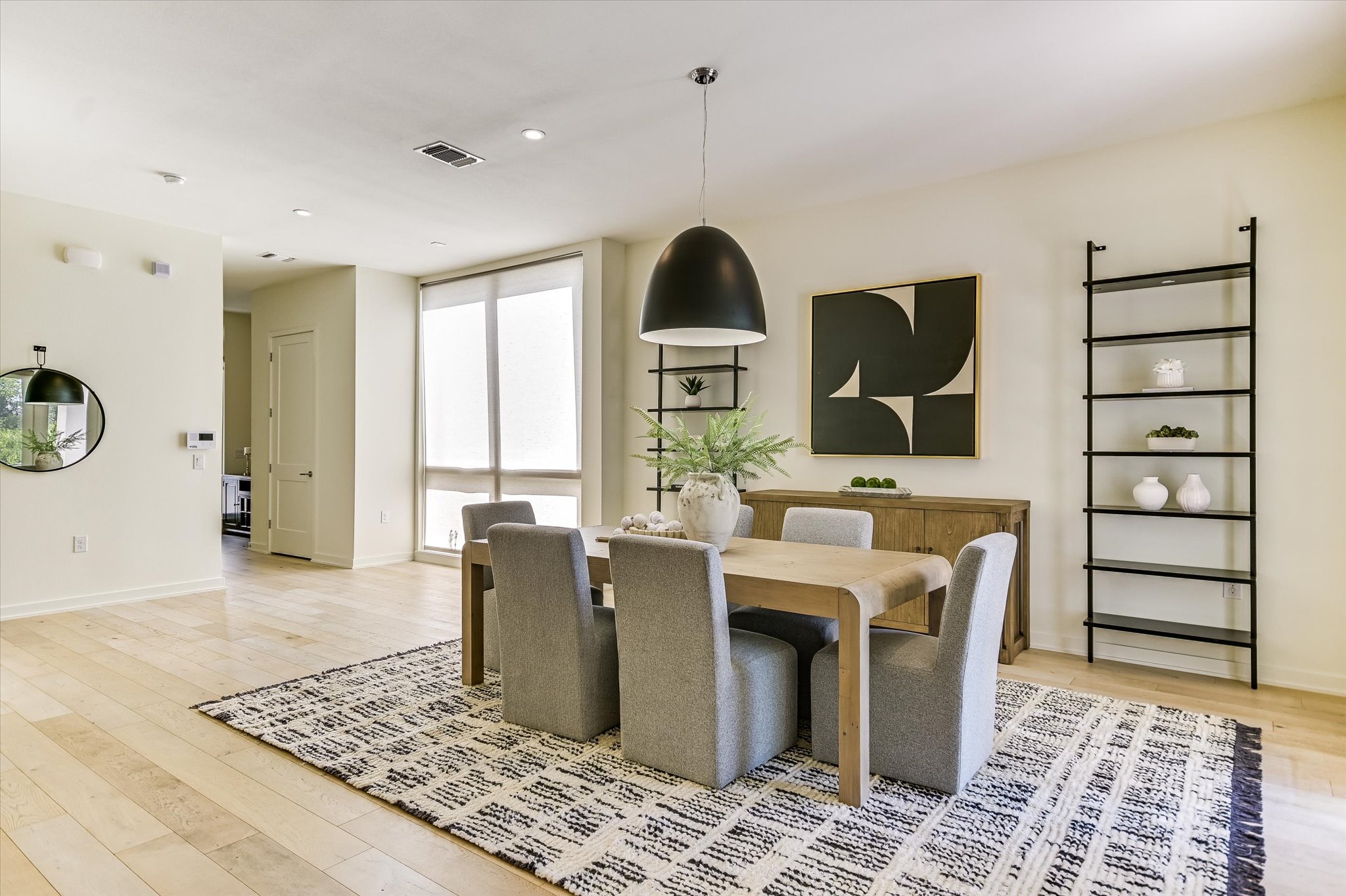2610 Watkins Way Austin, TX 78746 - Photo 5 of 23 a living room with furniture a rug and white walls