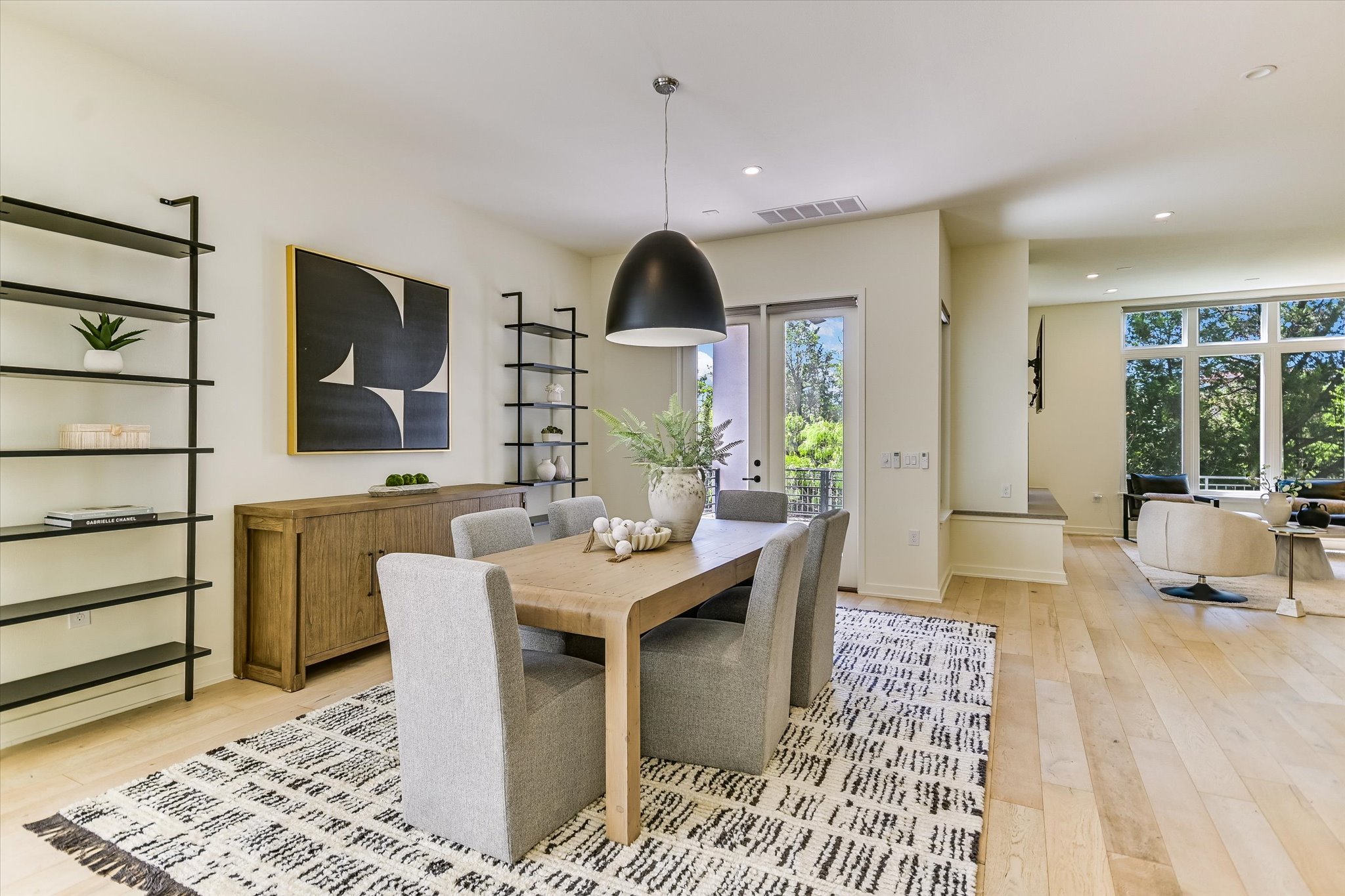 2610 Watkins Way Austin, TX 78746 - Photo 6 of 23 a living room with furniture a window and a dining table