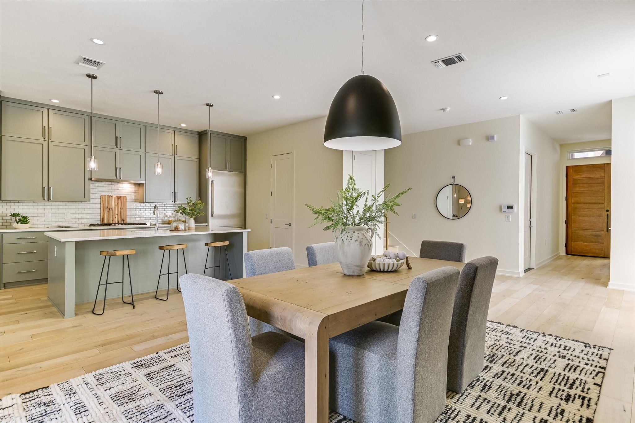 2610 Watkins Way Austin, TX 78746 - Photo 8 of 23 a view of a dining room with furniture