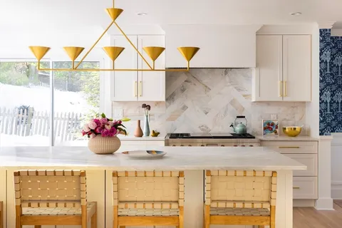 a kitchen with a sink a cabinets and window
