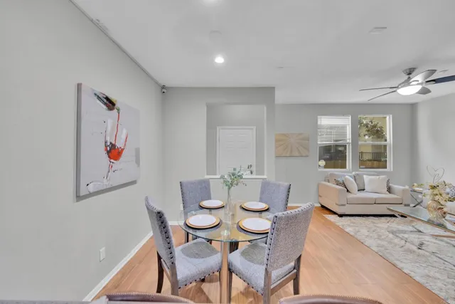 a view of a dining room with furniture window and outside view