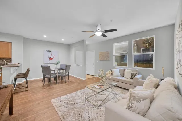 a living room with furniture and window