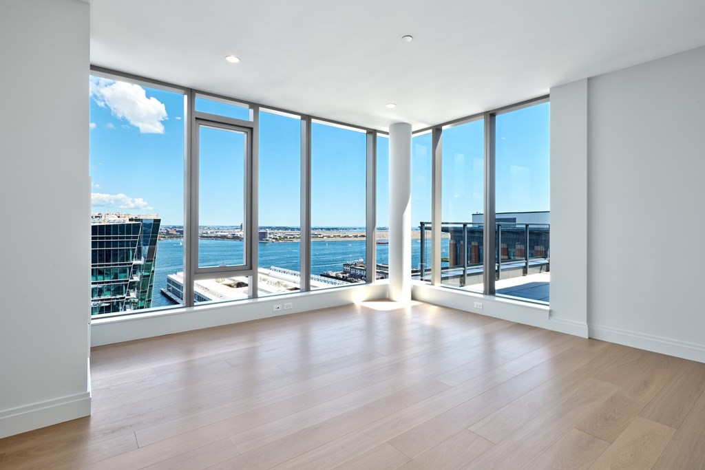 135 Seaport Boulevard, Unit PH3A Boston, MA 02210 - Photo 9 of 11 a view of an empty room with window