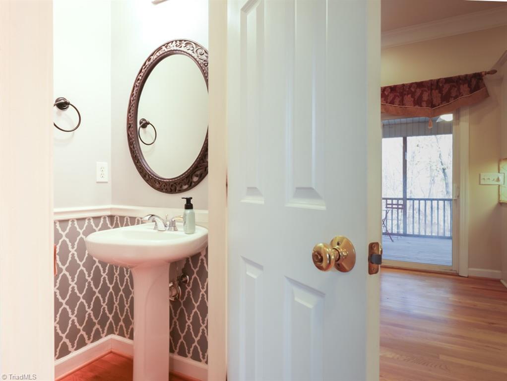 7840 Wilson Farm Road Summerfield, NC 27358 - Photo 18 of 47 Half bath on main level.