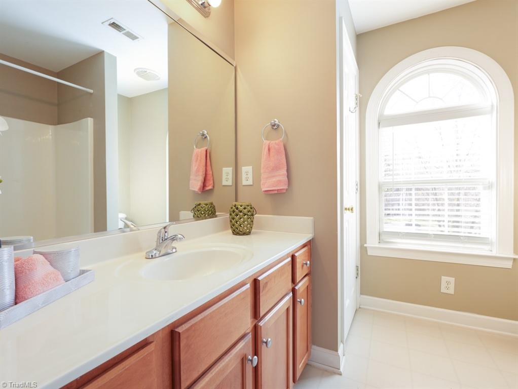 7840 Wilson Farm Road Summerfield, NC 27358 - Photo 27 of 47 Additional hall bath on second level.