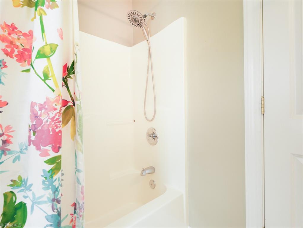 7840 Wilson Farm Road Summerfield, NC 27358 - Photo 29 of 47 Full tub and shower in hall bath.