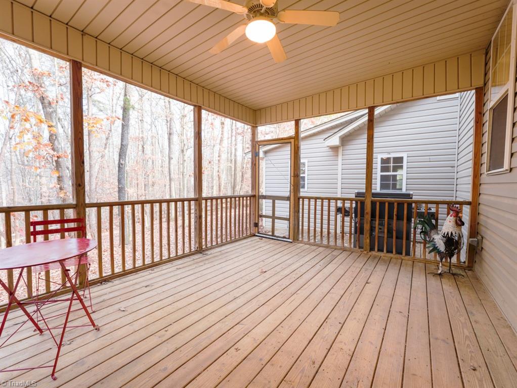 7840 Wilson Farm Road Summerfield, NC 27358 - Photo 36 of 47 Wonderful screened-in porch, a great place for entertaining.