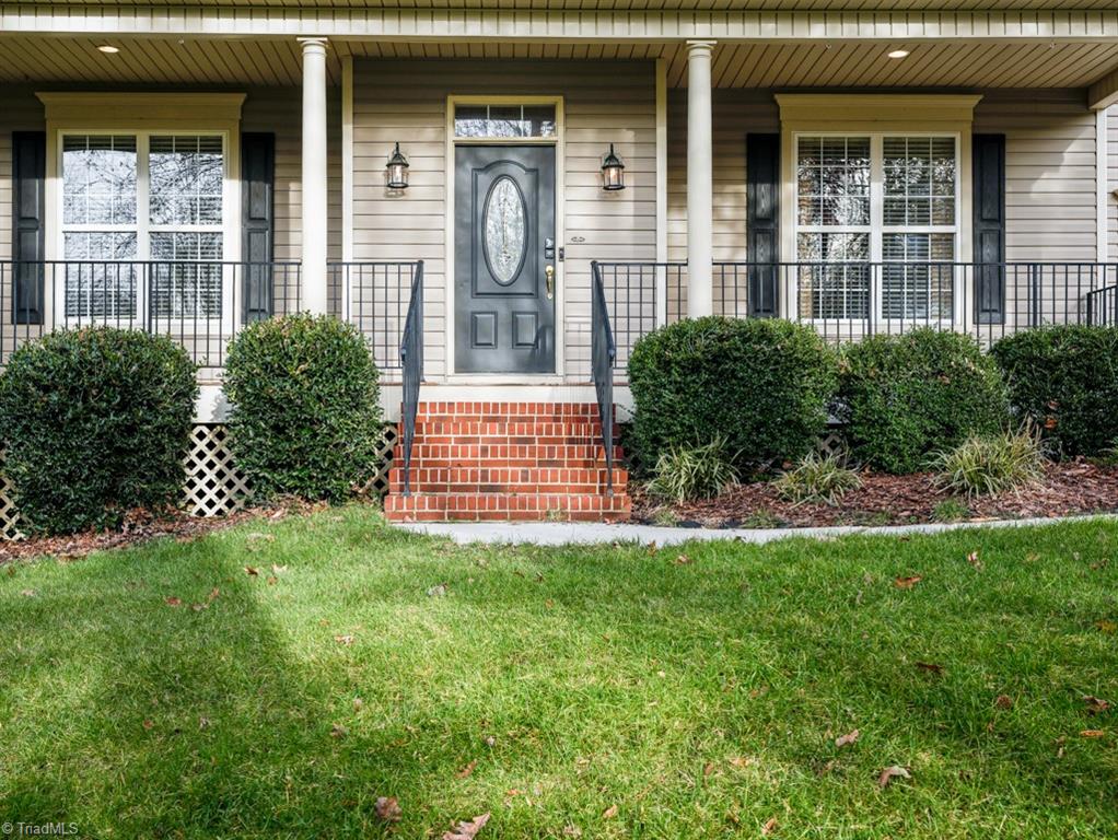 7840 Wilson Farm Road Summerfield, NC 27358 - Photo 4 of 47 Welcoming front porch to sit and relax.