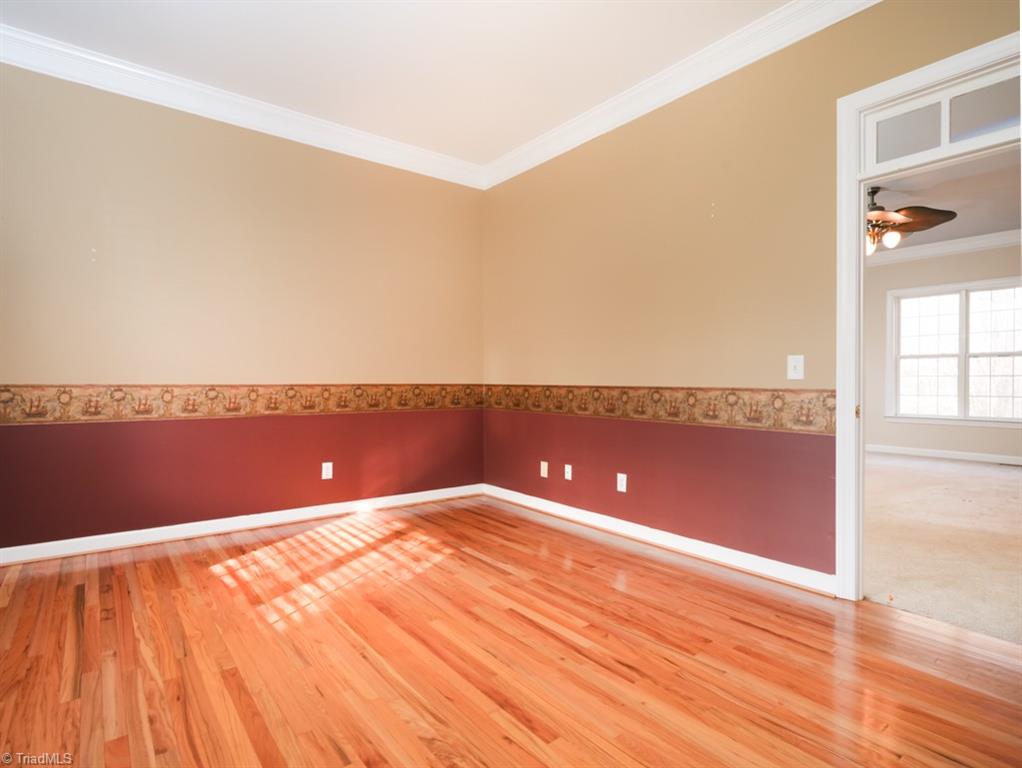 7840 Wilson Farm Road Summerfield, NC 27358 - Photo 8 of 47 Living room opens into Den.