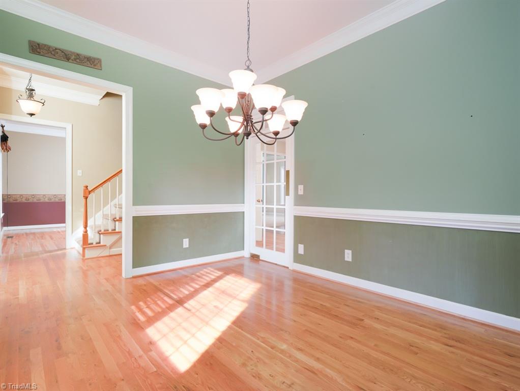 7840 Wilson Farm Road Summerfield, NC 27358 - Photo 9 of 47 Dining room on opposite side of entryway.