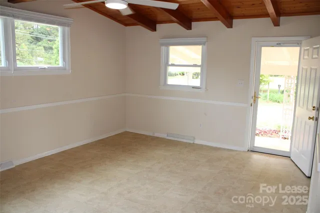 an empty room with windows