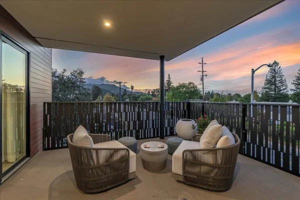 a balcony with furniture