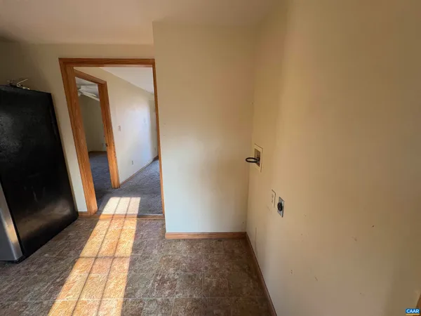 a room with a sink and a mirror