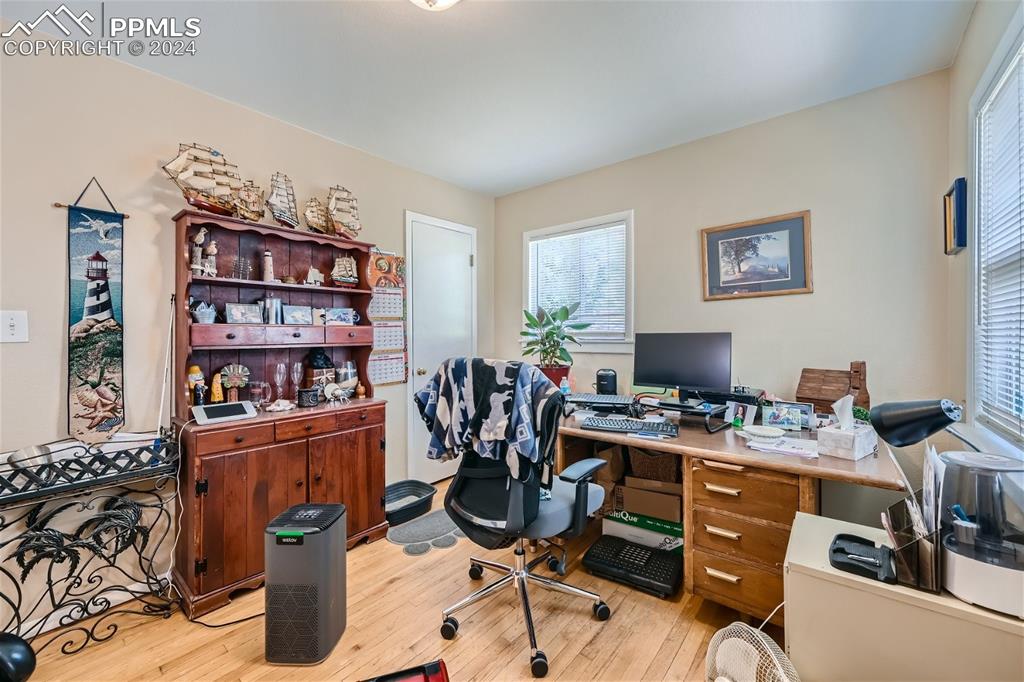 3103 Galley Road Colorado Springs, CO 80909 - Photo 11 of 25 a view of a workspace with furniture