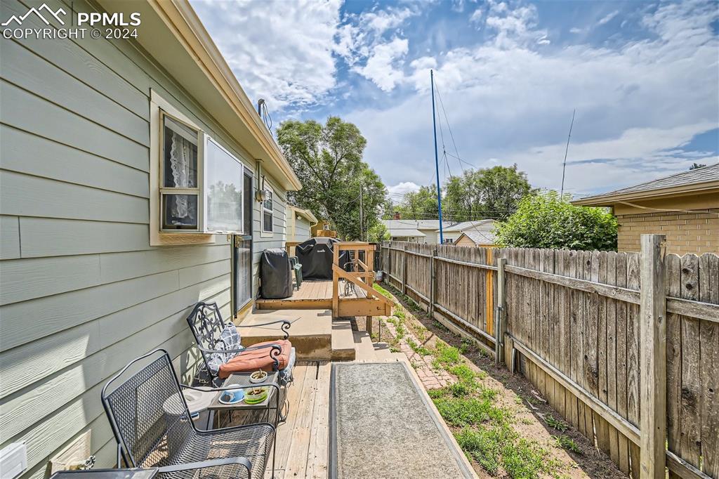 3103 Galley Road Colorado Springs, CO 80909 - Photo 19 of 25 a house view with a seating space