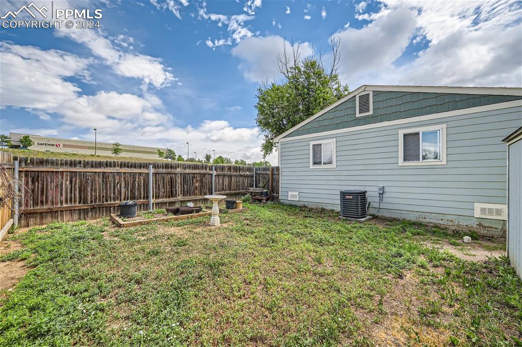 3103 Galley Road Colorado Springs, CO 80909 - Photo 21 of 25 a view of a backyard with sitting area