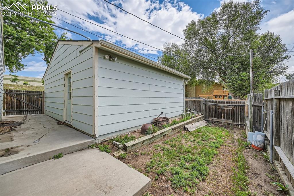 3103 Galley Road Colorado Springs, CO 80909 - Photo 24 of 25 a backyard of a house