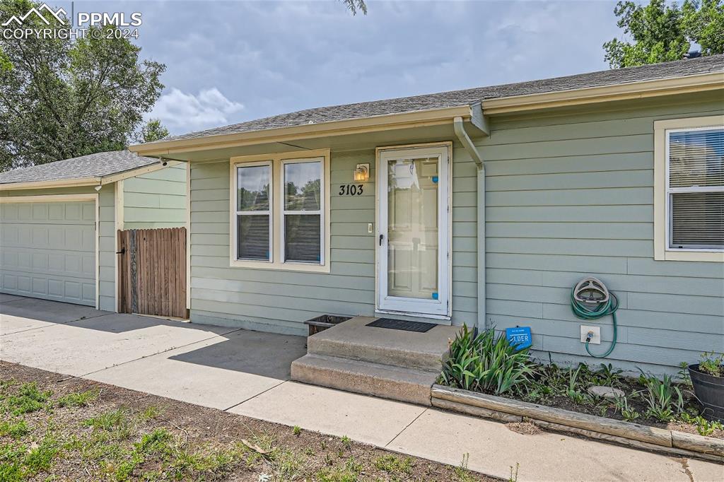 3103 Galley Road Colorado Springs, CO 80909 - Photo 3 of 25 a front view of a house